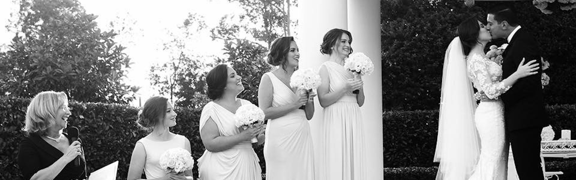 3dadf204-c3c1-4eb0-8ca1-a8ea4ce97071-Sarah & David Kiss copy.jpg