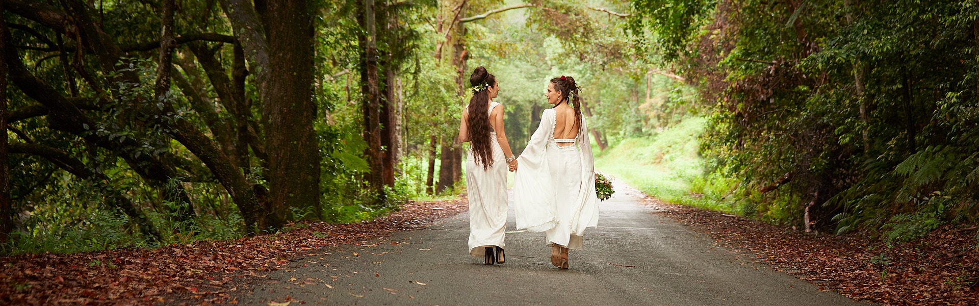 430cb1a9-9fc4-4d1e-b735-eb31ceb7370a-Two brides walking.jpg