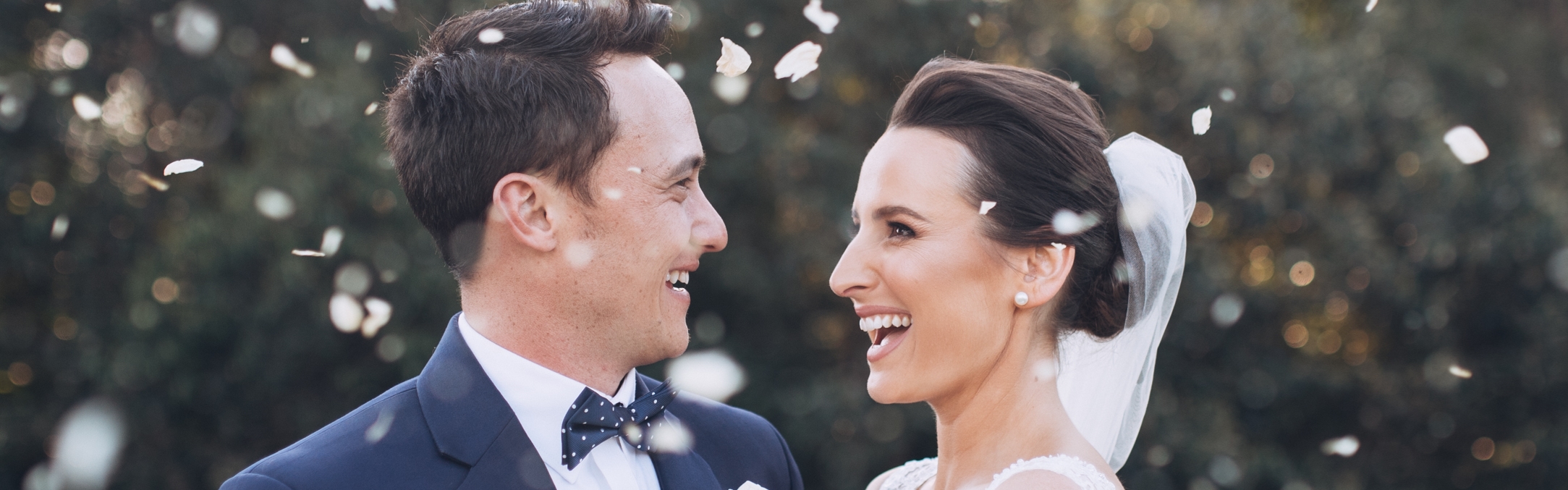 713e1710-b34c-46a3-9d2e-ec68a099d40a-Veronic & Scott showered by rose petals..jpg