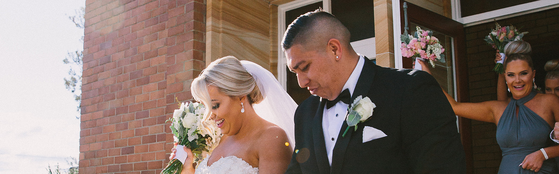 Bride & Groom leaving the church after ceremony