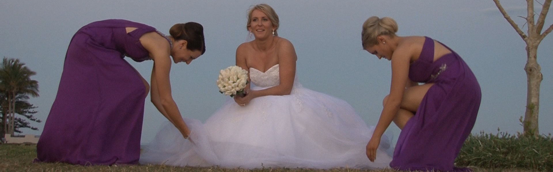 Getting the Bride ready for a photo