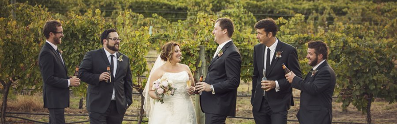 The Newlyweds With Their Groomsmen