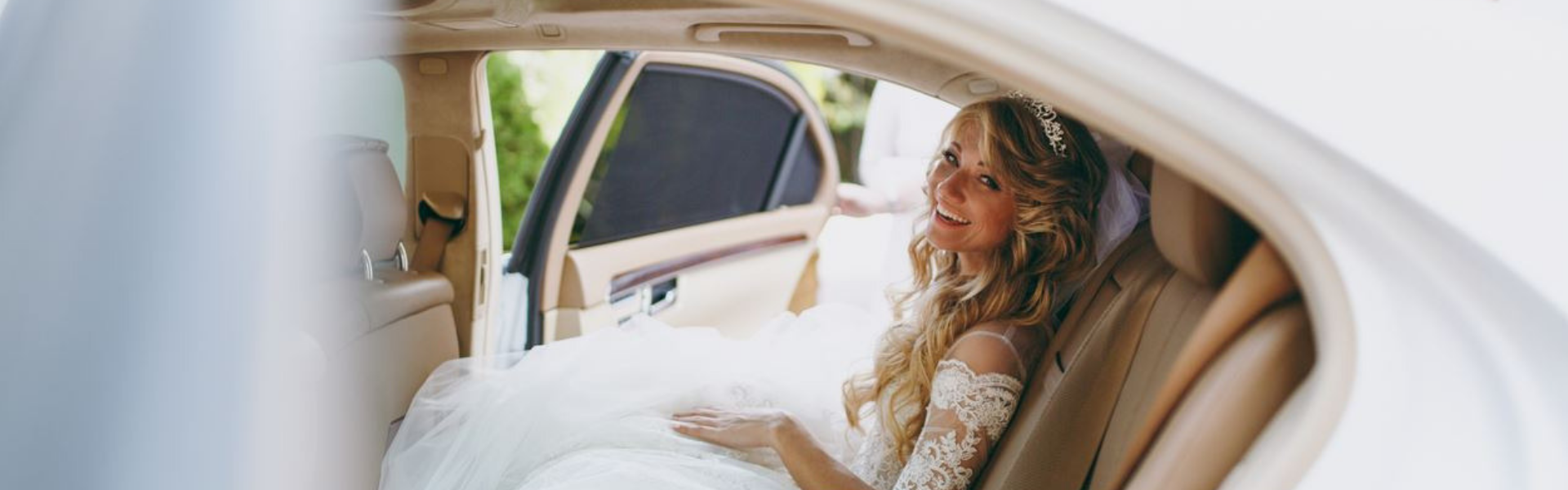 dba4ac37-8ff2-4fff-a6c1-07157ccea76c-bride white car.png