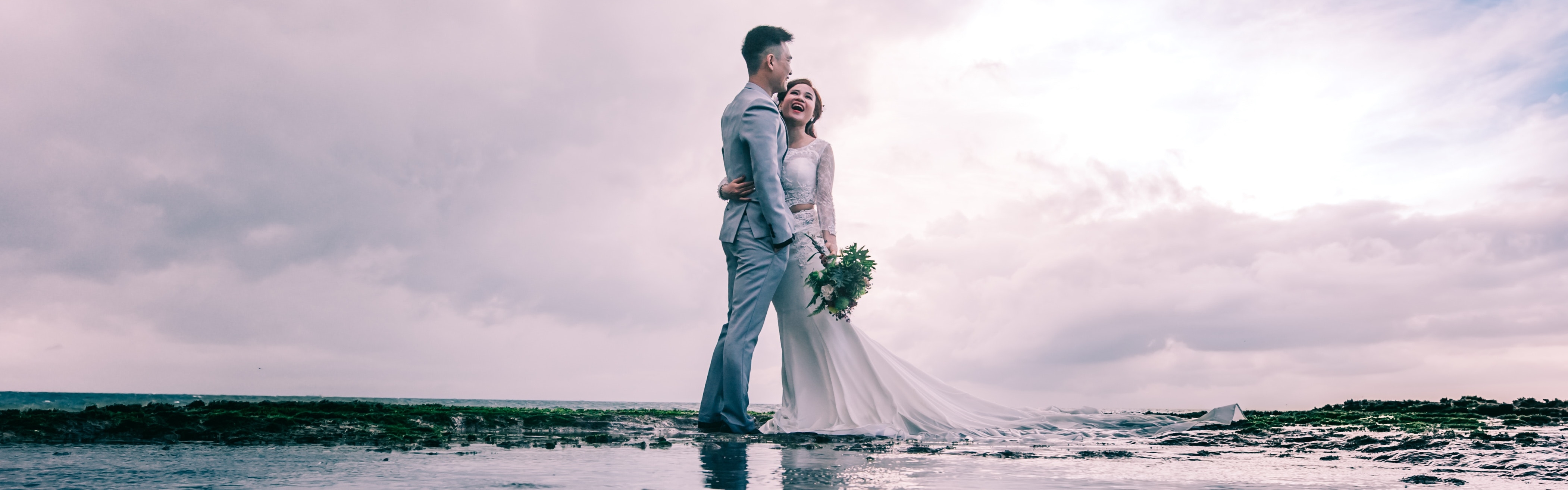 man-in-gray-dress-suit-jacket-embraces-woman-wearing-wedding-931796-6b95e1cd-5606-4777-93cd-5fd933bbae3c.jpg