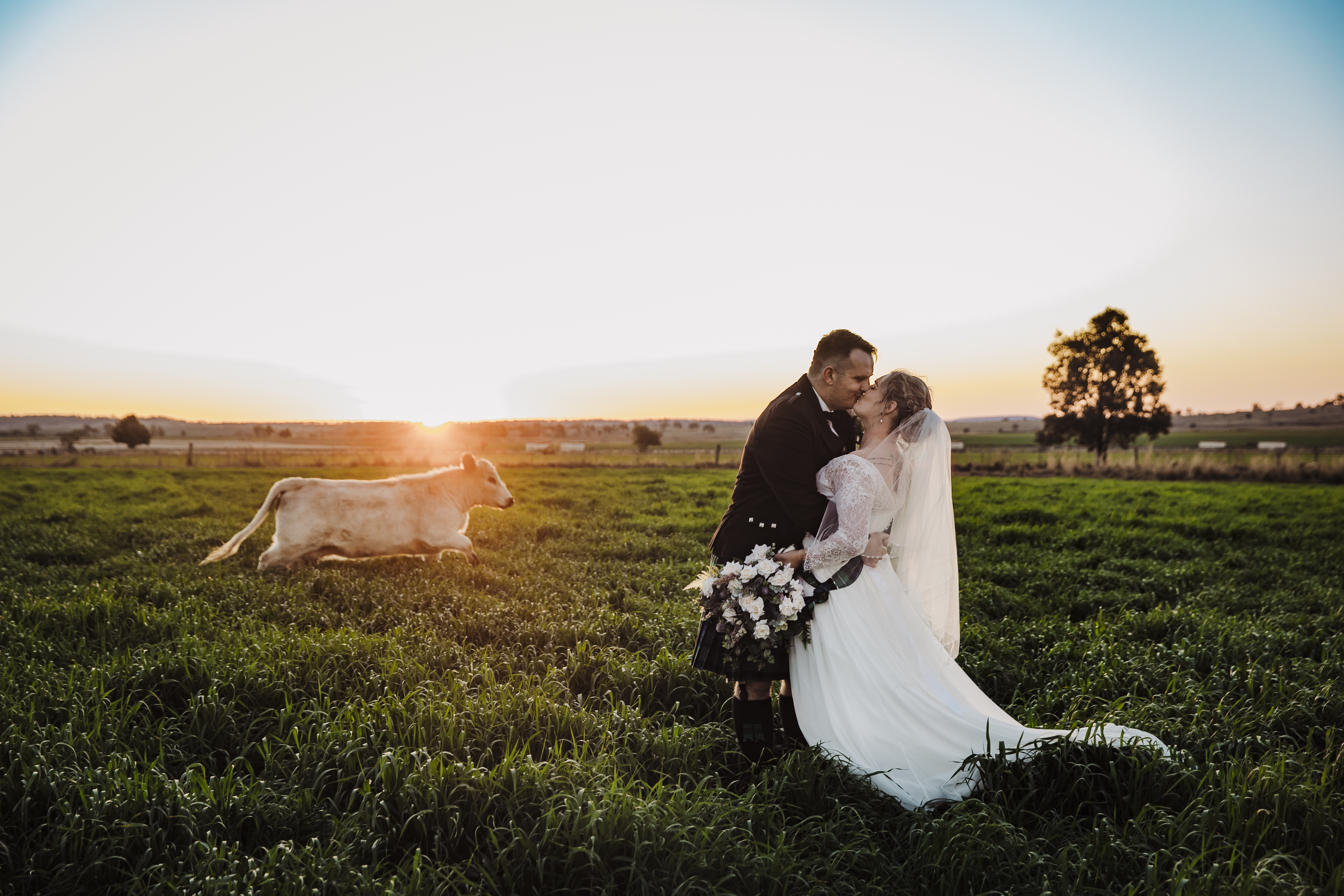 Tiffany Jane Photography + Film SupplierHero Wedding Photography