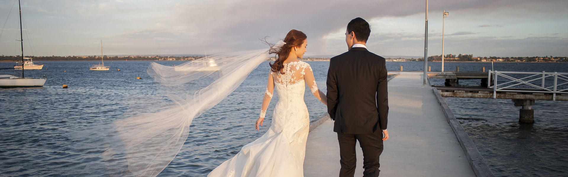wedding couple on jetty at acqua viva